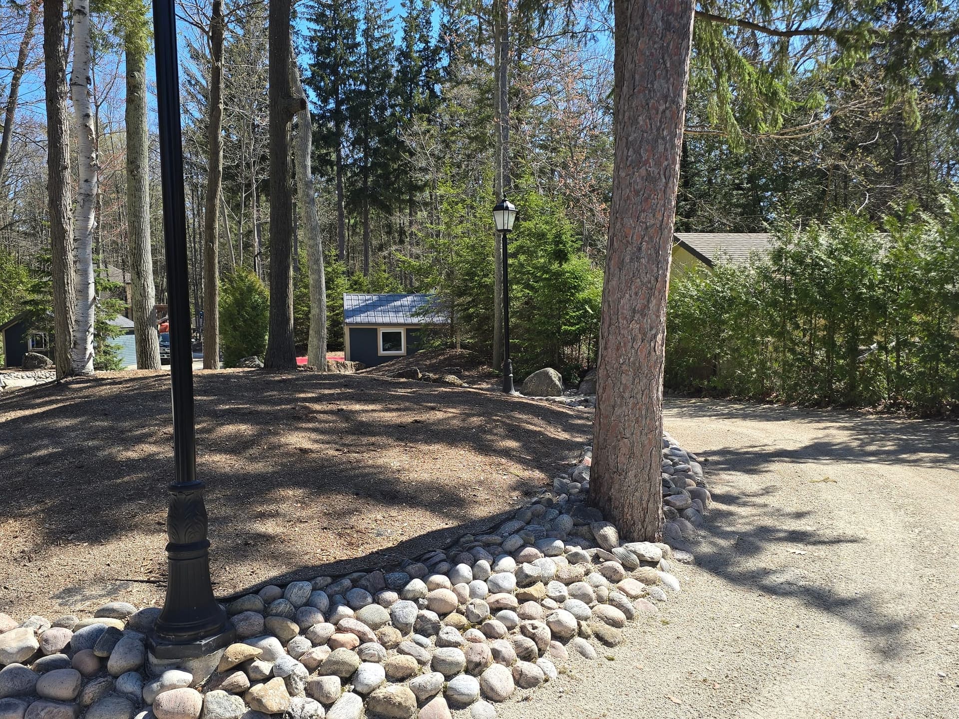 Redi-Rock installation by Stuart Thomas Construction — 20260508 105643. Materials supplied by The Sarjeant Co.