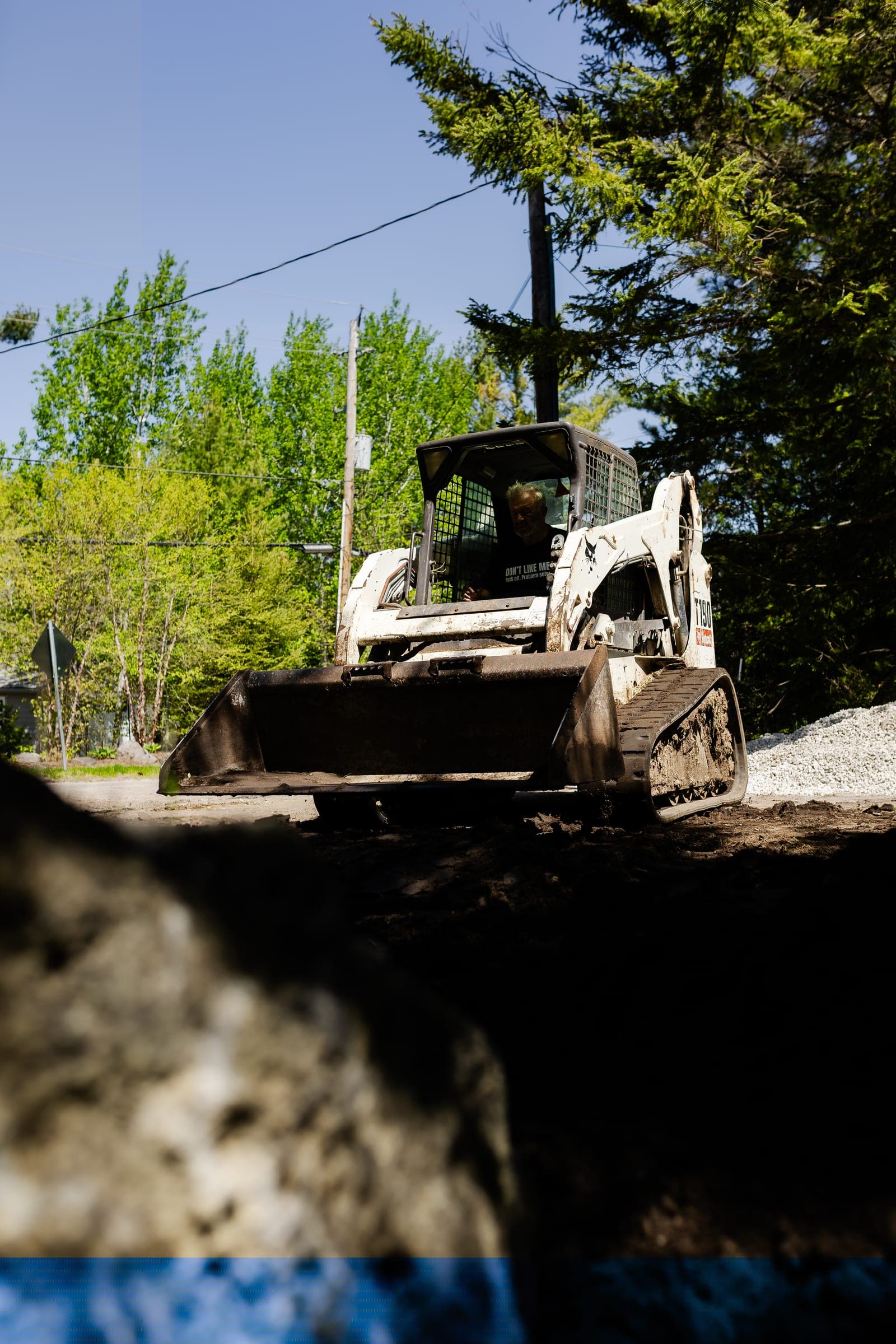 Stuart Thomas Construction — Redi-Rock retaining wall installation in South Georgian Bay — Stc 059. Materials supplied by The Sarjeant Co.