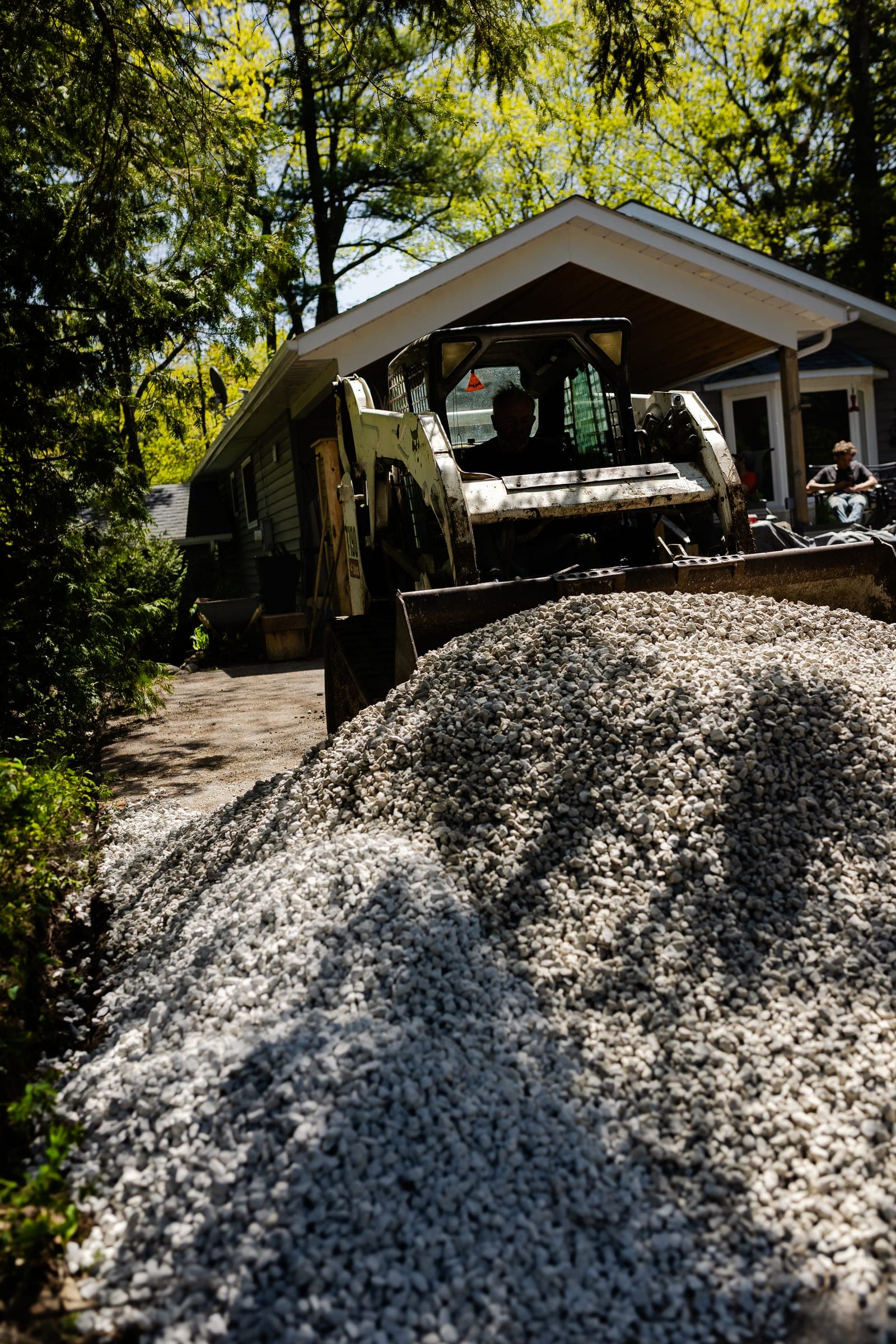 Stuart Thomas Construction — Redi-Rock retaining wall installation in South Georgian Bay — Stc 097. Materials supplied by The Sarjeant Co.