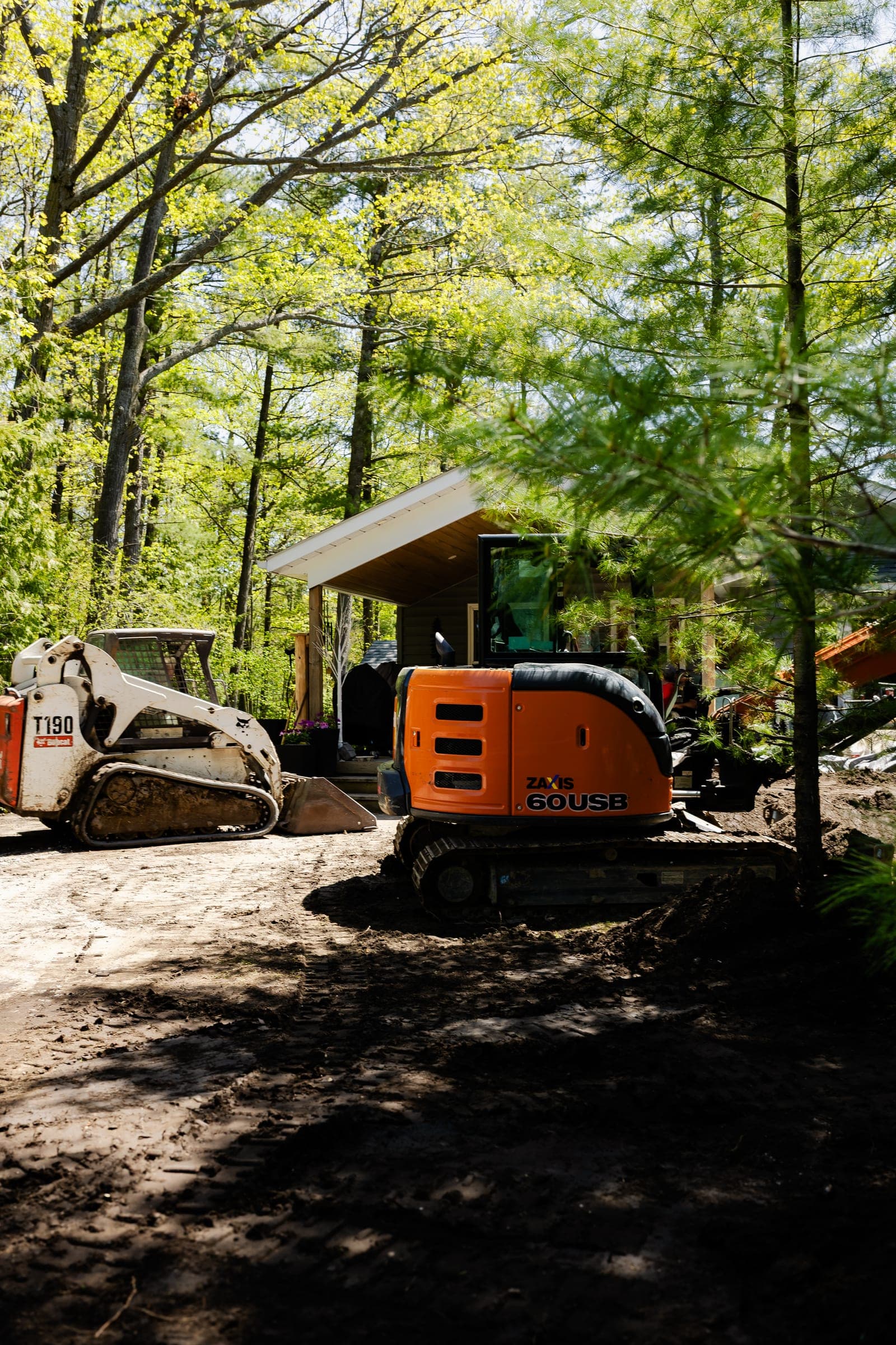 Stuart Thomas Construction — Redi-Rock retaining wall installation in South Georgian Bay — Stc 122. Materials supplied by The Sarjeant Co.