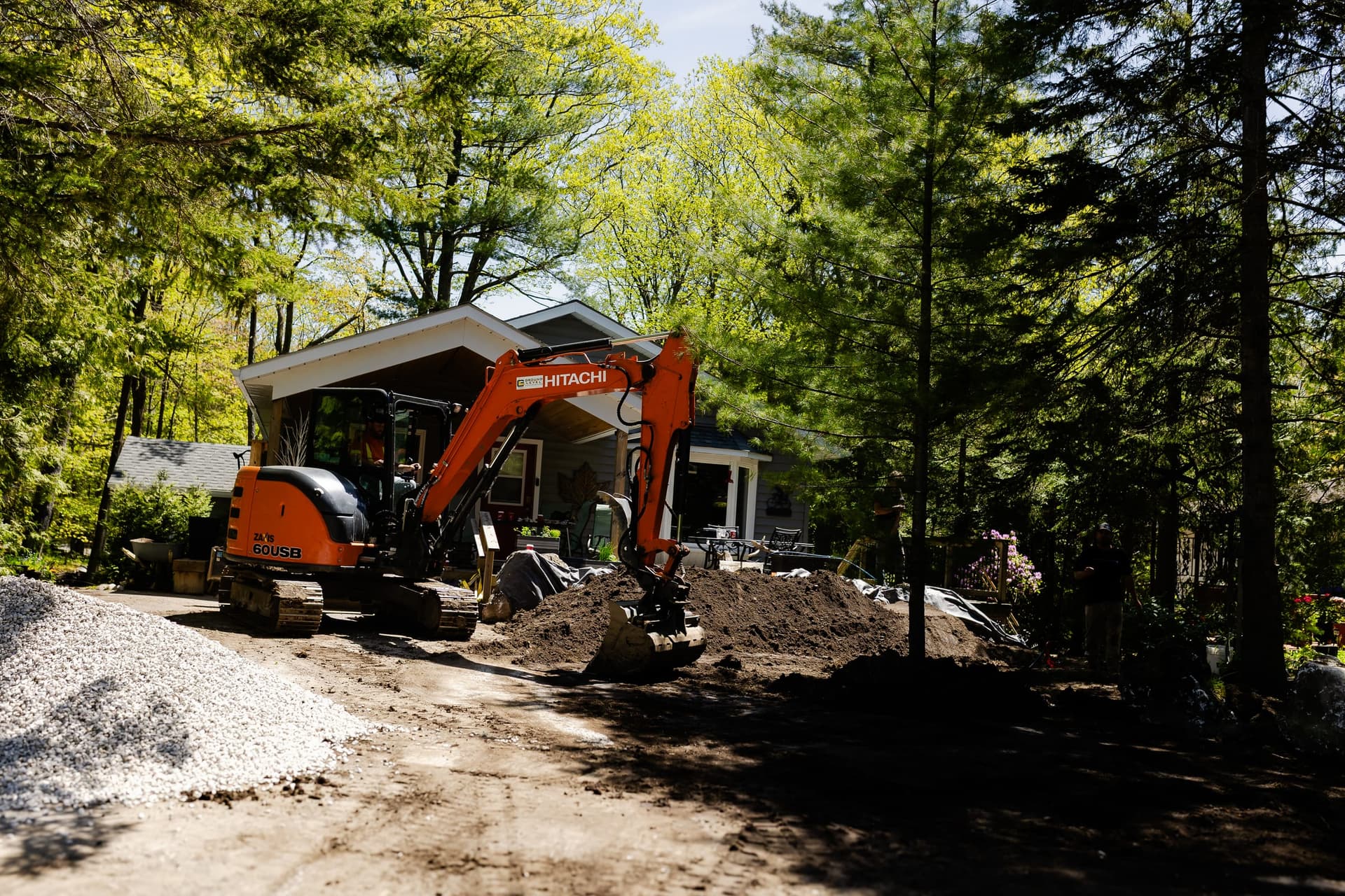 Stuart Thomas Construction — Redi-Rock retaining wall installation in South Georgian Bay — Stc 277. Materials supplied by The Sarjeant Co.